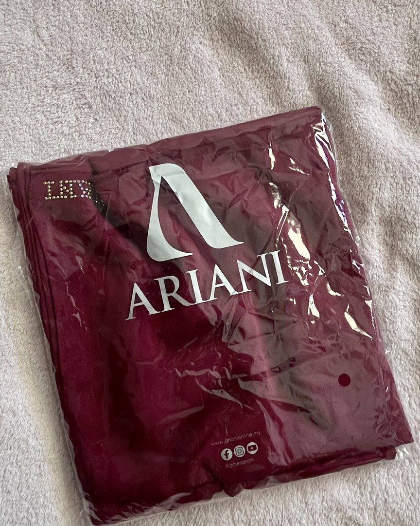 Ariani Satin Shawl in Deep Red/Burgundy/Maroon (Category: Hijabs) located in Kuala Lumpur. Submitted by flsunn (Listing ID 1426798492, Image 3). Description: Normal Price RM89 Brand New bought on 14/3 Reason to sell, bought another shawl Free paper bag.