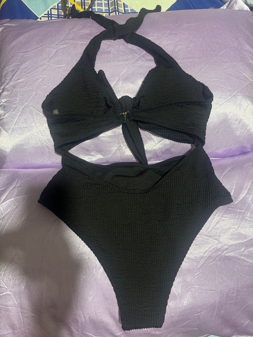 Black textured cut out one piece swimsuit (Category: Bikinis & Swimsuits) located in Manila. Submitted by olivia0907 (Listing ID 1426891614, Image 2). Description: Black textured cut out bikini. Cut out is on the top part of the stomach and back. It’s flattering as it accentuates the waist part and also pushes the boobs together. Size: Medium MOP: Gcash and bank transfer only. Delivery shouldered by buyer. RFS: Declutterring .