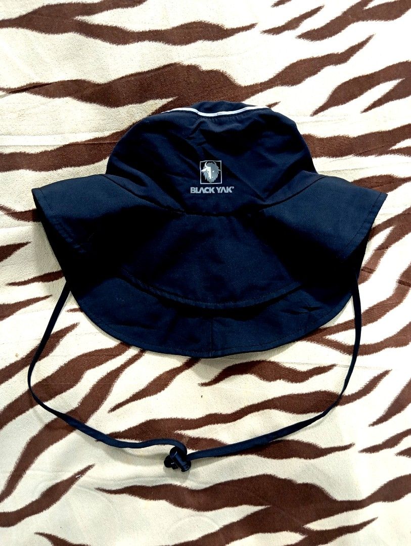 Black Yak Gore-Tex Hat (Category: Caps & Hats) located in Davao. Submitted by jhegaloutdoorshop (Listing ID 1426795269, Image 1). Description: Black Yak hat with Gore-Tex technology. Features a wide brim and adjustable chin strap. Includes a small logo on the front and a label inside. Designed by Mountaineers. Has a mesh lining for breathability. Includes snap buttons on the side..