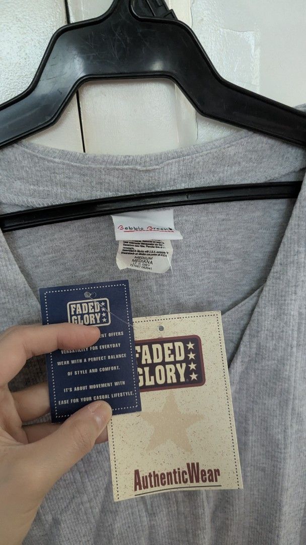 Bobbie Brooks Gray Cardigan Top with Inner (Category: Coats, Jackets and Outerwear) located in Muntinlupa City. Submitted by lsfinds (Listing ID 1426833734, Image 3). Description: Gray cardigan with Inner top. Features a V-neckline and button-down closure. The short sleeves make it suitable for warmer weather. The tag indicates it is an authentic wear item. A versatile piece that can be paired with various outfits..