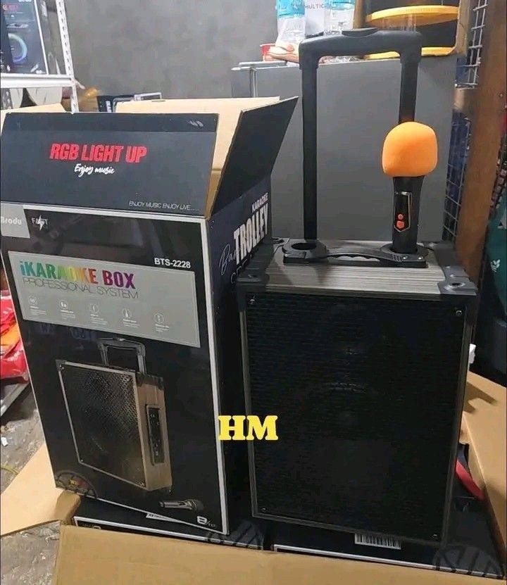 Brodu BTS-2228 8" Karaoke Box Speaker (Category: Soundbars, Speakers & Amplifiers) located in Manila. Submitted by legitseller_angel06 (Listing ID 1426797139, Image 2). Description: Brodu BTS-2228 karaoke box speaker features Bluetooth, USB, TF, and line-in connectivity. It includes a wireless microphone and a USB charging cable. The speaker has an 8-inch size and RGB light. It has a trolley design for easy transport. The unit dimensions are 30x2