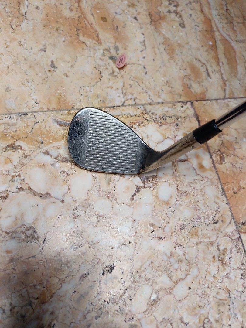 Callaway Forged 52 Wedge (Category: Golf) located in Manila. Submitted by yeonmei5614747 (Listing ID 1426843128, Image 2). Description: Callaway Forged 52 wedge. The club head has visible wear. The club is designed for precision shots around the green. The club face has grooves for spin and control. It is a right-handed club..