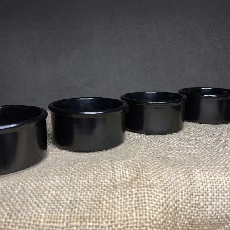 Cermer Black Ramekins (Category: Bakeware) located in Bulacan. Submitted by ceramicscubby (Listing ID 1426850380, Image 2). Description: Size: 3.3 D x 1.6 H in. ❗️ALL PRICES ARE MARKED DOWN❗️ Freezer, Oven and Microwave safe. Set of black ramekins. The ramekins have a glossy finish. The bottom of the ramekins have a white base with a logo. The ramekins are stackable. Perfect for baking or serving individual portions..