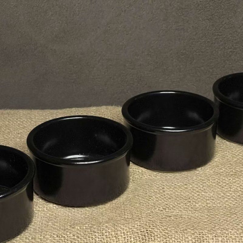 Cermer Black Ramekins (Category: Bakeware) located in Bulacan. Submitted by ceramicscubby (Listing ID 1426850380, Image 1). Description: Size: 3.3 D x 1.6 H in. ❗️ALL PRICES ARE MARKED DOWN❗️ Freezer, Oven and Microwave safe. Set of black ramekins. The ramekins have a glossy finish. The bottom of the ramekins have a white base with a logo. The ramekins are stackable. Perfect for baking or serving individual portions..