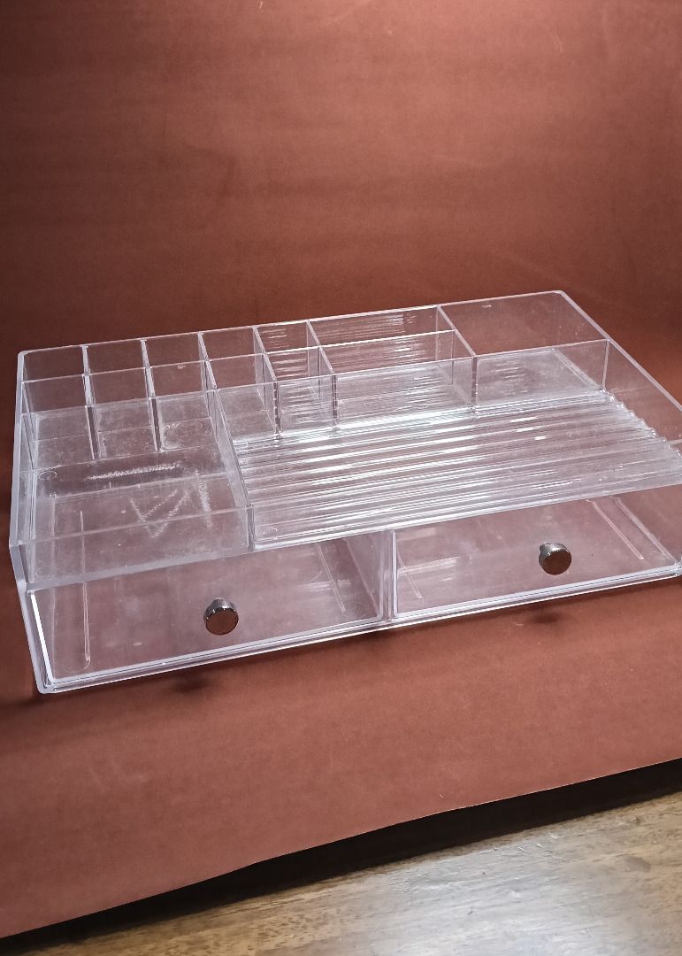 Clear Acrylic Makeup Organizer with Drawers (Category: Makeup) located in San Juan City. Submitted by vt_horang (Listing ID 1426860973, Image 1). Description: - Used for 1-1.5 years - 10 lipstick slots, 2 small rectangle slots, 2 small square slots, area for pencils/liners, 2 drawers - Good for those with many small palettes or many pencils/liners! - Slightly dusty.