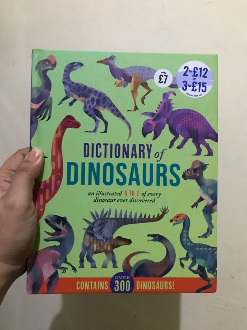Dictionary of Dinosaurs Book (Category: Children's Books) located in Dumarao. Submitted by mellowbabe23 (Listing ID 1426897530, Image 1). Description: Book is a dictionary of dinosaurs, featuring an illustrated A to Z of every dinosaur ever discovered. It contains over 300 dinosaurs. The book has a green cover with various dinosaur illustrations. It has a price tag of £7, with offers for multiple purchases..