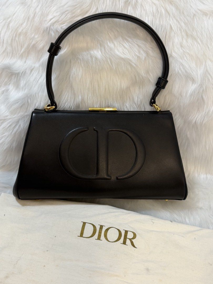 Dior CD Signaure Bag Black Leather Handbag (Category: Luxury Bags & Wallets) located in Manila. Submitted by srbpreloved (Listing ID 1426891338, Image 1). Description: Preloved With dustbag only Coded bag Self authenticate.