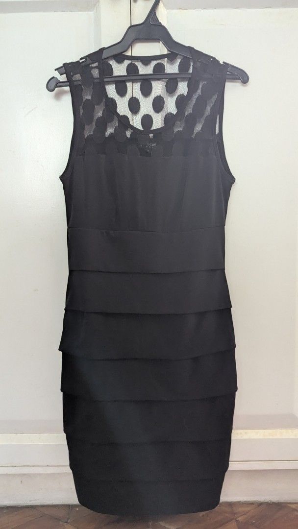 En Focus Studio Black Dress Size 6 (Category: Dresses) located in Muntinlupa City. Submitted by lsfinds (Listing ID 1426834315, Image 1). Description: Elegant black dress from En Focus Studio. Features a unique polka dot mesh neckline and a tiered skirt design. It is a size 6 and made in Indonesia. Perfect for a special occasion or a night out..