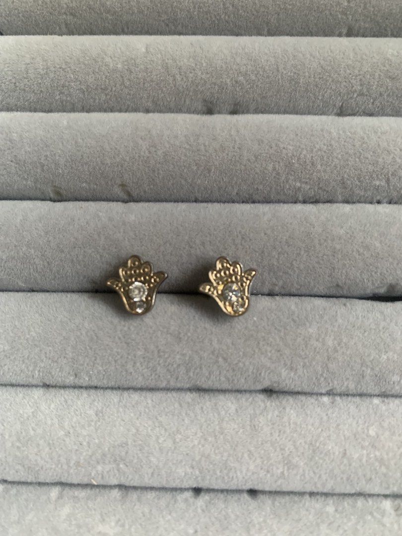 Esoteric whimsical Goldtoned Hamsa and Leaf Earrings (Category: Earrings) located in Tarlac. Submitted by thrice.closet (Listing ID 1426811454, Image 2). Description: ₱100 each or ₱150 take all.