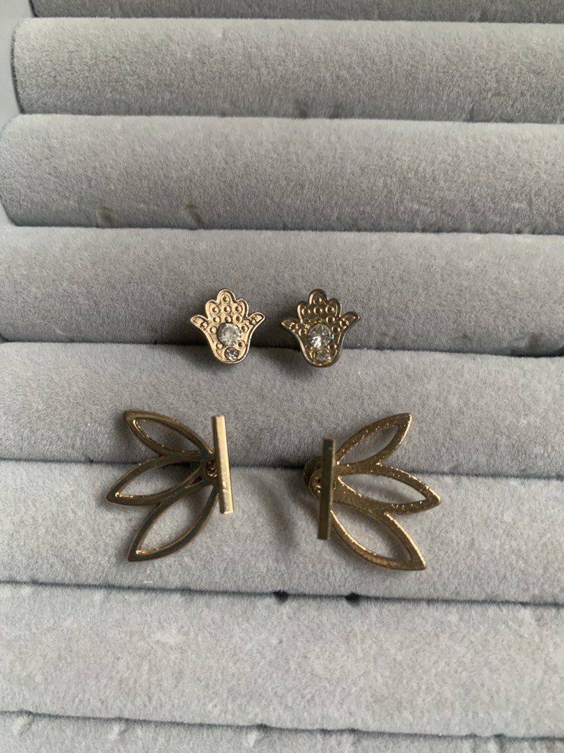 Esoteric whimsical Goldtoned Hamsa and Leaf Earrings (Category: Earrings) located in Tarlac. Submitted by thrice.closet (Listing ID 1426811454, Image 1). Description: ₱100 each or ₱150 take all.