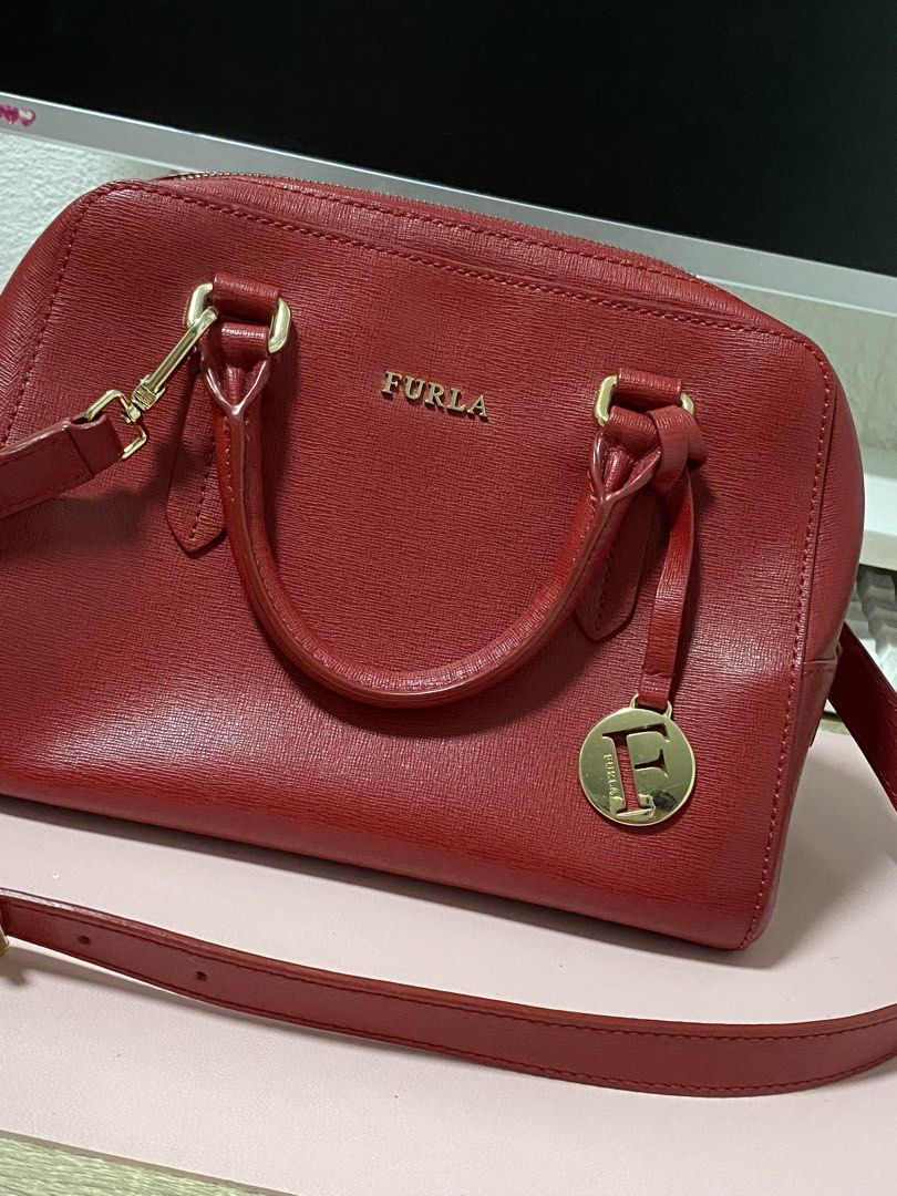 Furla Red Handbag with Shoulder Strap (Category: Luxury Bags & Wallets) located in Angeles City. Submitted by sjd_stuff (Listing ID 1426945159, Image 2). Description: .