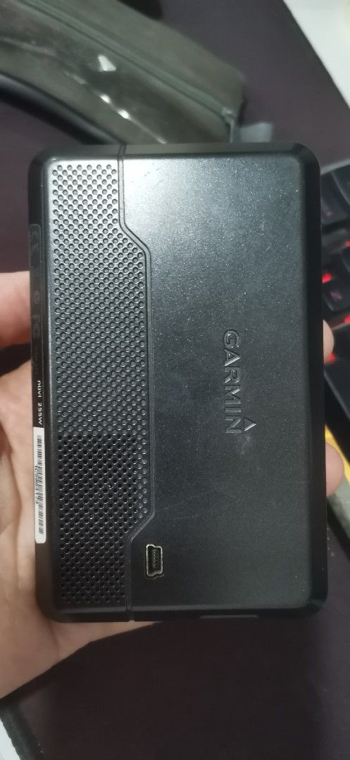 Garmin nuvi 255W GPS Navigator (Category: Wearables & Smart Watches) located in General Santos City (Dadiangas). Submitted by sam_surplus (Listing ID 1426889780, Image 2). Description: Garmin nuvi 255W GPS navigator. Features a screen and a textured back with the Garmin logo. The side shows the model number and other details. Includes a mini-USB port. bought from surplus.. i dont know if its working or not.