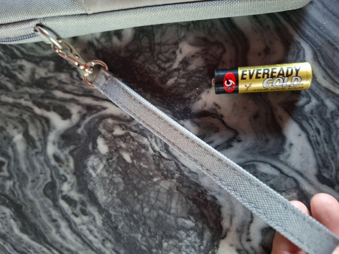 Gray Tablet Sleeve with Wrist Strap (Category: Cases & Sleeves) located in Taguig. Submitted by d_man11 (Listing ID 1426800716, Image 3). Description: - Barely used Tablet Sleeve Bag - Fits up to 8 inch tablets - Soft cushioned pouch for tablet - 1 External pocket - Wrist strap for easy carrying - pre loved, used but not abused - water resistant Dimensions: 9 x 6.25 inches.