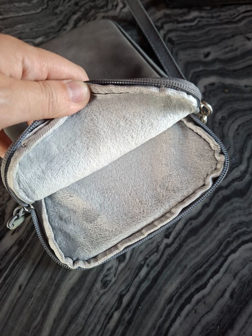 Gray Tablet Sleeve with Wrist Strap (Category: Cases & Sleeves) located in Taguig. Submitted by d_man11 (Listing ID 1426800716, Image 2). Description: - Barely used Tablet Sleeve Bag - Fits up to 8 inch tablets - Soft cushioned pouch for tablet - 1 External pocket - Wrist strap for easy carrying - pre loved, used but not abused - water resistant Dimensions: 9 x 6.25 inches.