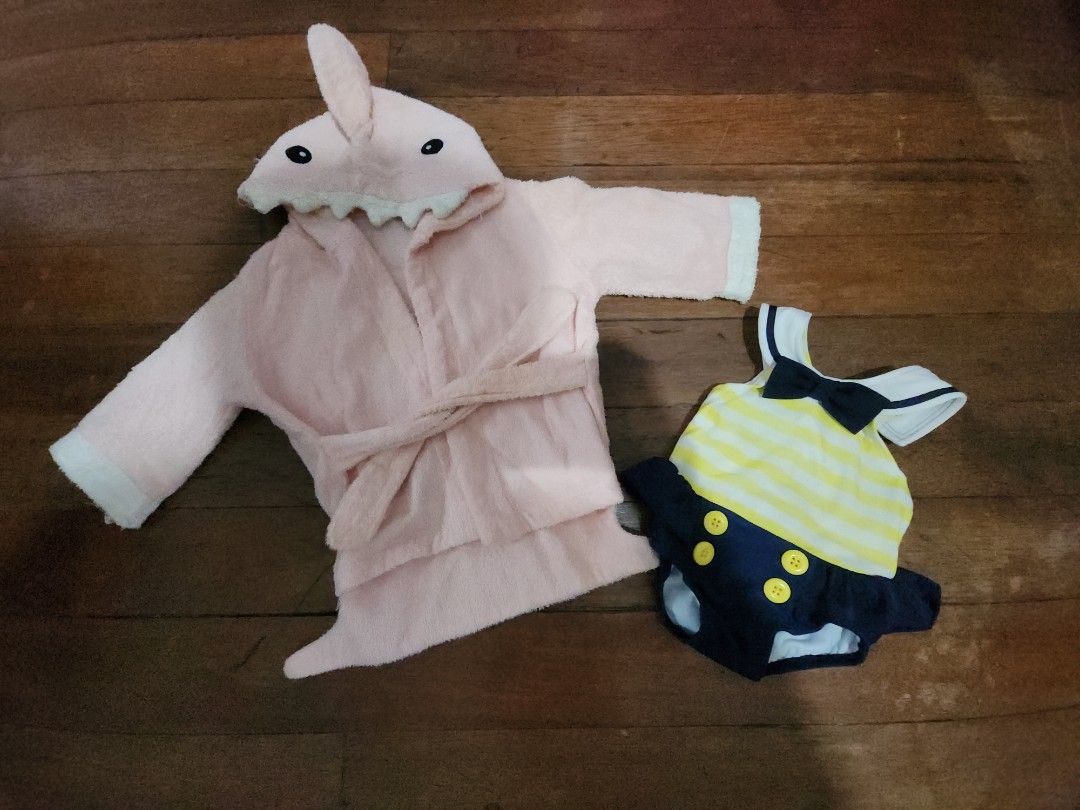 Gymboree Swimsuit with Shark robe (Category: Babies & Kids Fashion) located in Mandaluyong City. Submitted by eayoh (Listing ID 1426871953, Image 2). Description: baby swimsuit 3-6months robe towel used once and stored.