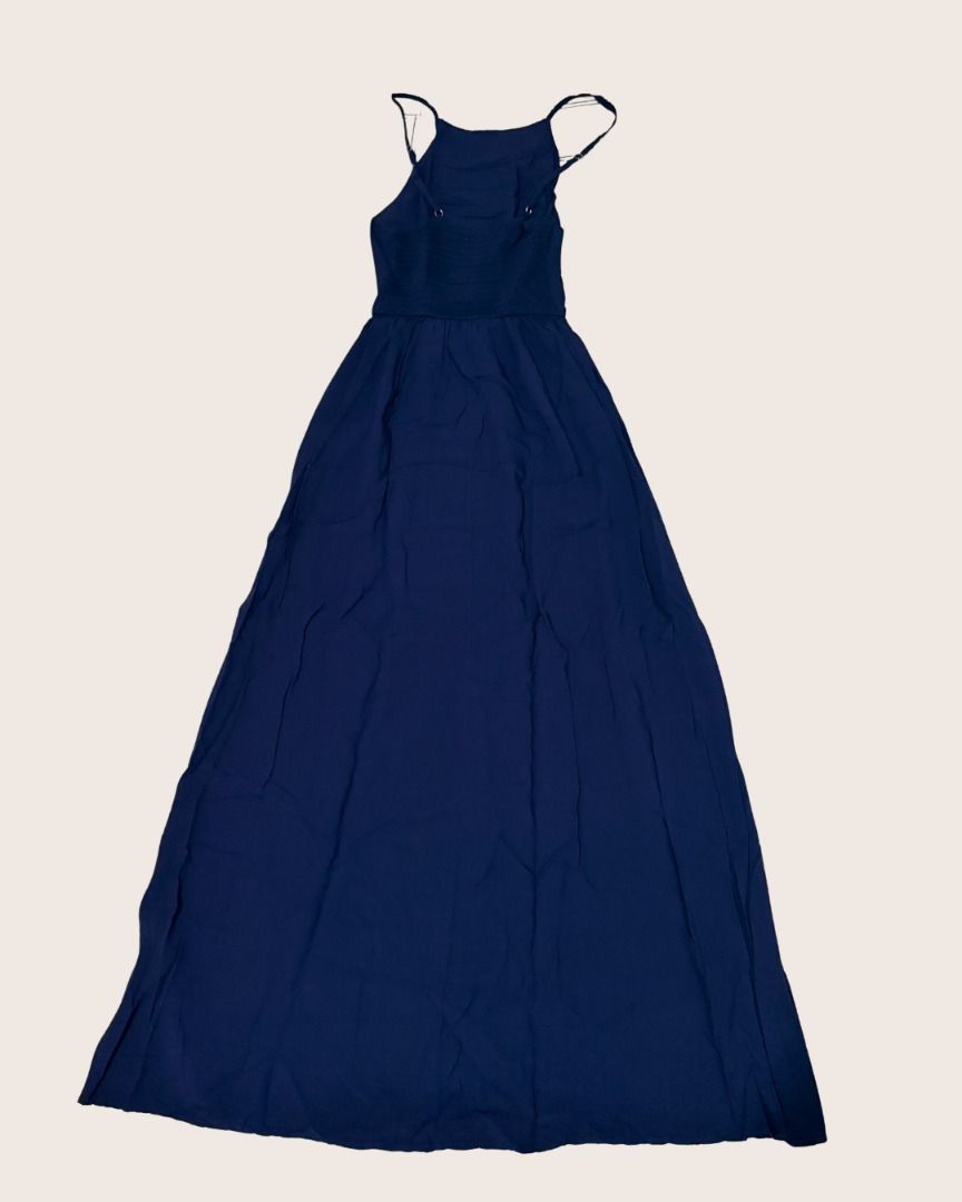 Halterneck Navy Blue Maxi Dress (Category: Dresses) located in Abucay. Submitted by rewornstudio (Listing ID 1426923131, Image 2). Description: -Perfect for summer, beach outings or even casual wear! -Light, flowy fabric -Good condition, only slightly used -can fit small to medium.
