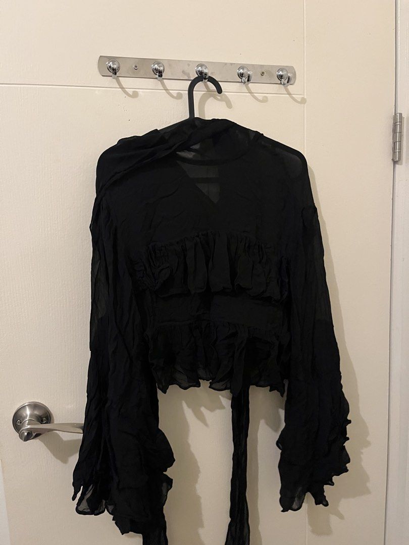 H&M EditionBlack Ruffle Blouse with frills (Category: Blouses) located in Mandaluyong City. Submitted by cleantea00 (Listing ID 1426840024, Image 2). Description: Size: S L -16’ B - 14’.