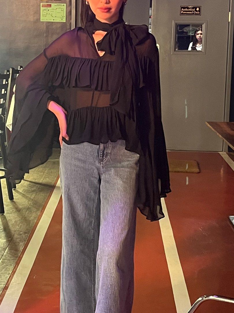 H&M EditionBlack Ruffle Blouse with frills (Category: Blouses) located in Mandaluyong City. Submitted by cleantea00 (Listing ID 1426840024, Image 3). Description: Size: S L -16’ B - 14’.