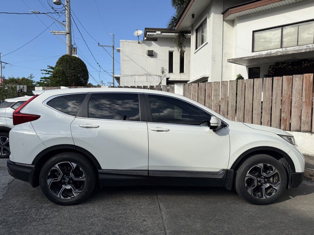 Honda CR-V 2.0 (A) (Category: Used Cars) located in Quezon City. Submitted by ramreyes31 (Listing ID 1426905220, Image 3). Description: Honda CRV 2018 Model Bought December 2017 5-Seater Gas Automatic Pearl White Well maintained and driven daily Mileage: 98k km Clean title No major accidents All maintenance and repairs done in casa Issues: Dashboard warning on tire pressure. Must be sensor only. One of the rear tail lights not working. May need r