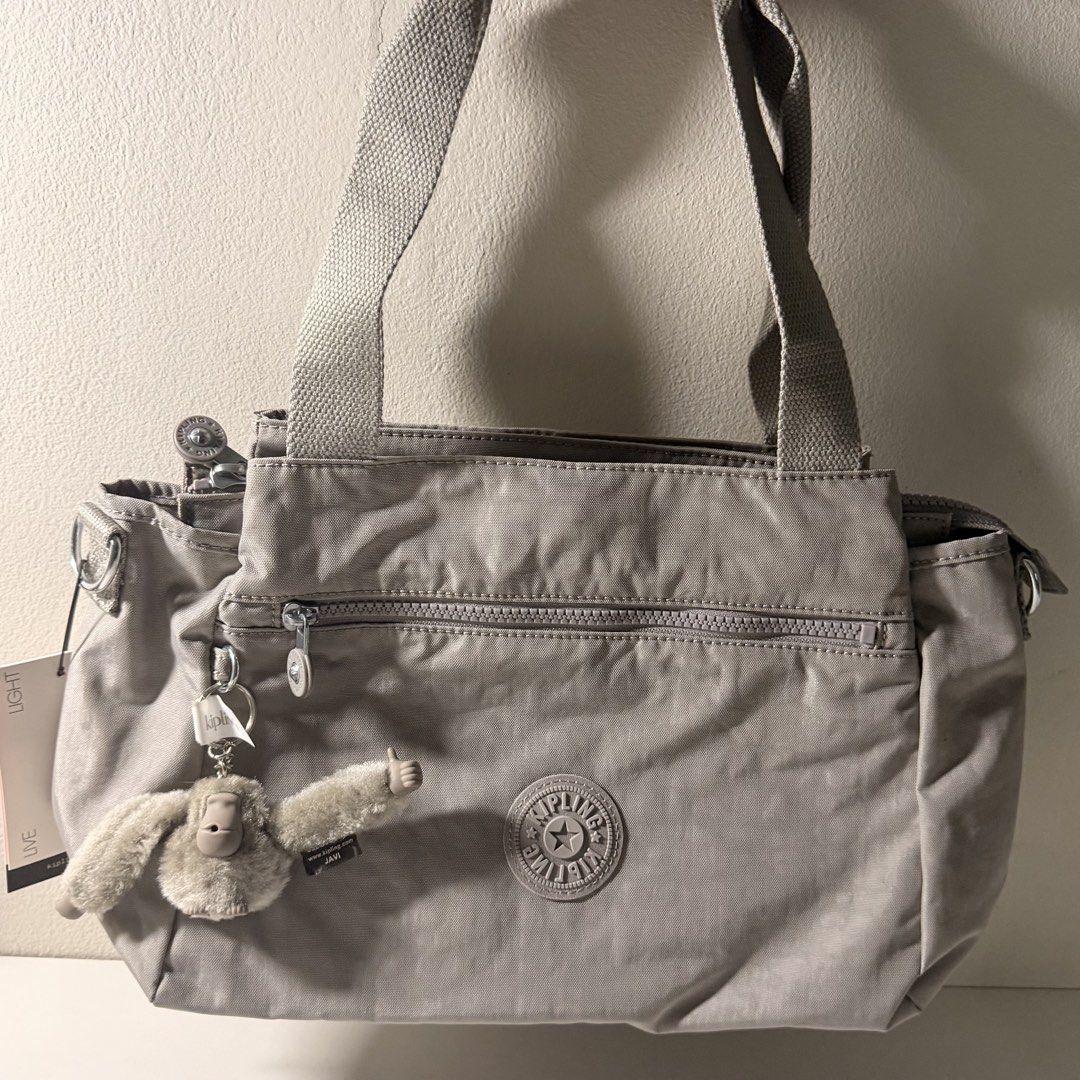 Kipling ELYSIA Medium Shoulder Bag - Grey Gris (Category: Purses & Pouches) located in Quezon City. Submitted by declutterwcha (Listing ID 1426898831, Image 2). Description: Kipling ELYSIA Medium Shoulder Bag - Grey Gris Condition: Brand New MOP: BPI, Unionbank Shipping Method: c/o Buyer * Lalamove, Grab, Moveit - Metro Manila * LBC, JRS - Outside Metro Manila Please send a message for further details ✨.