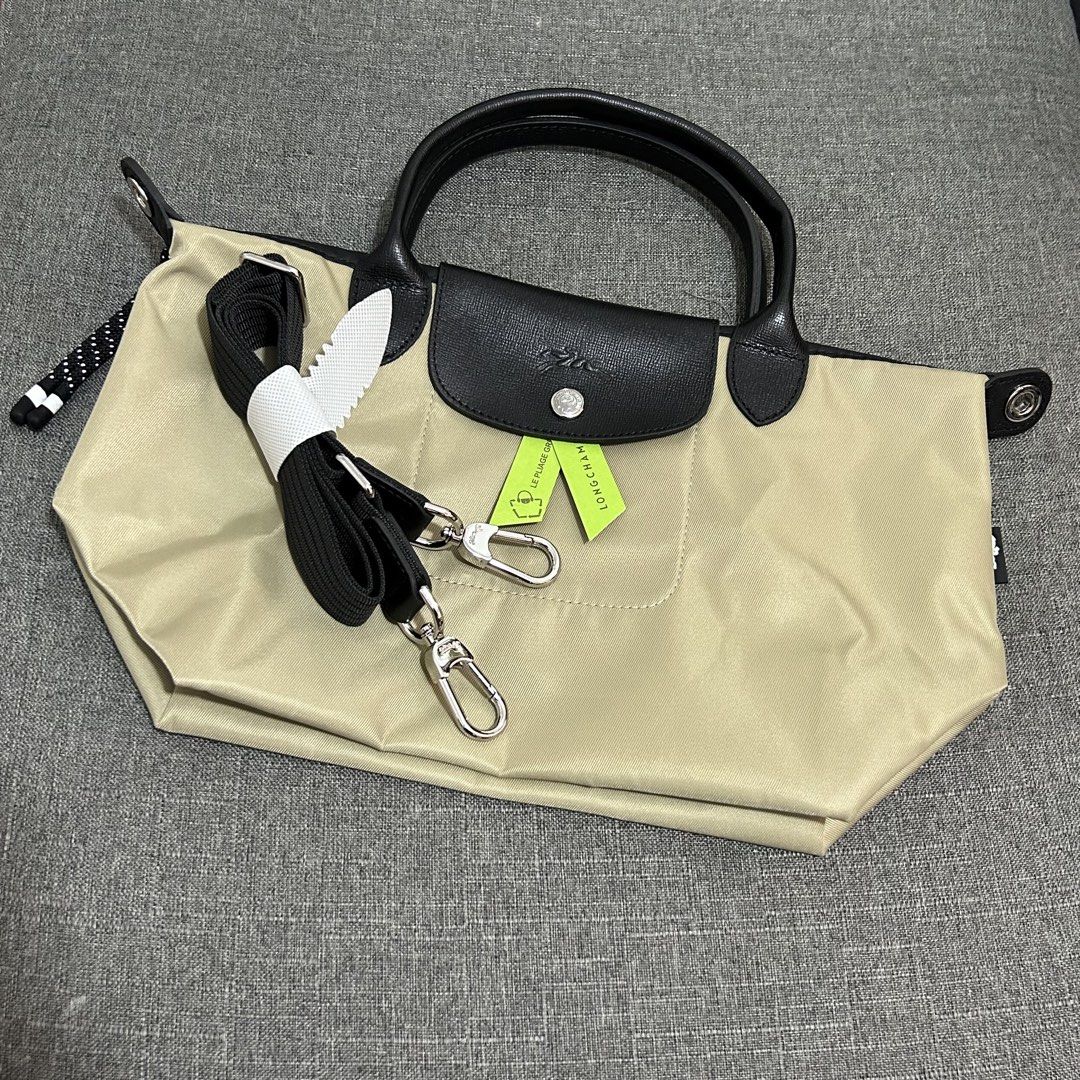 Longchamp Energy Le Pliage (Category: Luxury Bags & Wallets) located in Makati City. Submitted by lux.mariah (Listing ID 1426909731, Image 2). Description: Guaranteed authentic LC Energy available in Black and Khaki Color. Message for more photos XS- 10500 Small - 11500 Mop: Bank transfer, Gcash, Paymaya and Gotyme .