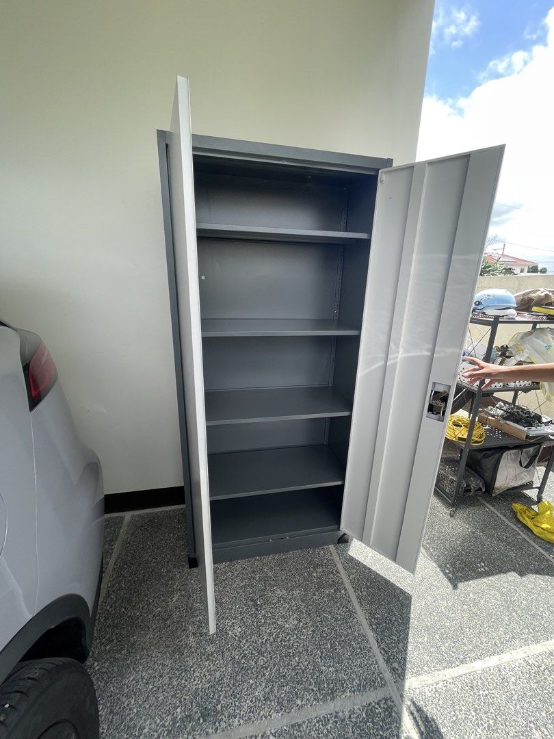 Metal Storage Cabinet with Shelves (Category: Shelves, Cabinets & Racks) located in Cavite. Submitted by ralphfrncsc (Listing ID 1426958227, Image 2). Description: Brand New! 90x40x185cm Free Installation Malagasang Imus Cavite 09500647701 6500 + DF.
