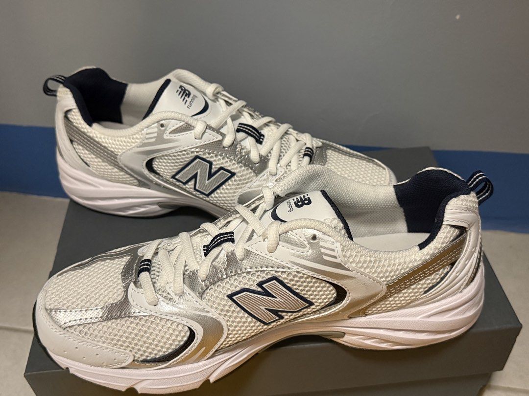 New Balance 350 White and Navy (Category: Sneakers) located in Pasig City. Submitted by clearup1 (Listing ID 1426887561, Image 1). Description: New Balance MR530 Mens - White and Navy Brand new! Size: Us 9 Mens.