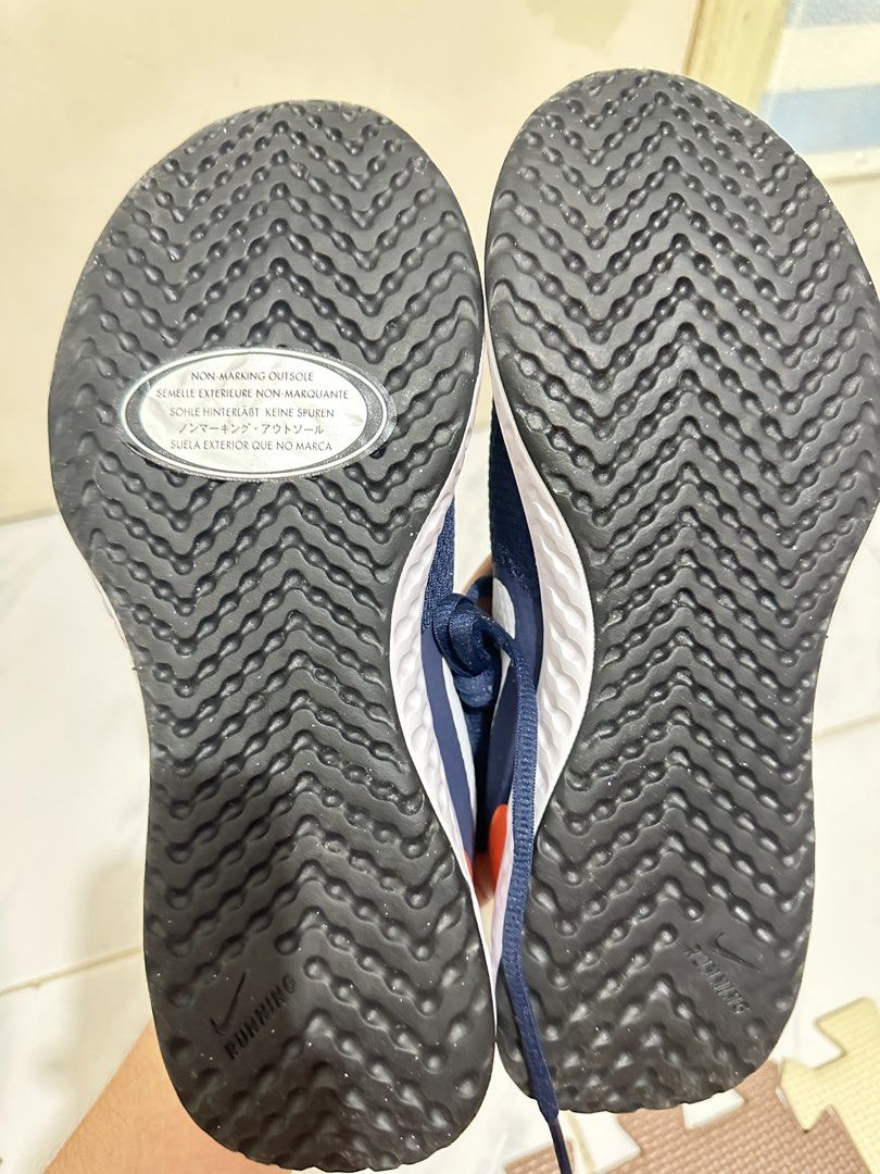 Nike Revolution 5 Navy Blue Orange (Category: Sneakers) located in Paranaque City. Submitted by leannebont35668 (Listing ID 1426883794, Image 2). Description: No box Size 6y.
