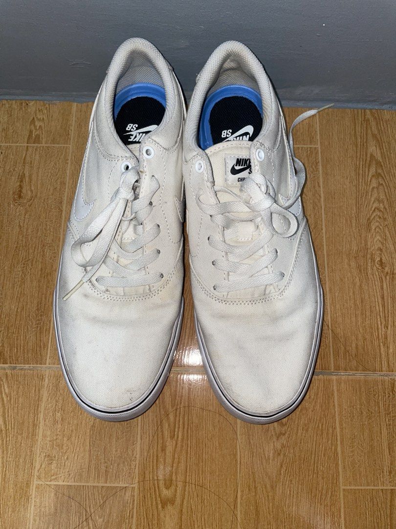 Nike SB Charge Canvas White Sneakers (Category: Sneakers) located in Manila. Submitted by phenommae (Listing ID 1426792648, Image 2). Description: Nike SB Chron 2 Canvas (White) – US 10 Used but not abused. Pasalubong from abroad, natambak lang. Still in good condition, just needs cleaning..
