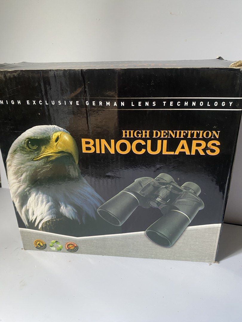 Original Nikon High Denifition Binoculars (Category: Lens & Kits) located in Manila. Submitted by lairx_mari (Listing ID 1426802942, Image 3). Description: High-quality Nikon binoculars. Features High Denifition and German Lens Technology. Comes with a carrying strap. The binoculars are black. The box shows an eagle and the binoculars themselves. Perfect for bird watching or outdoor activities..