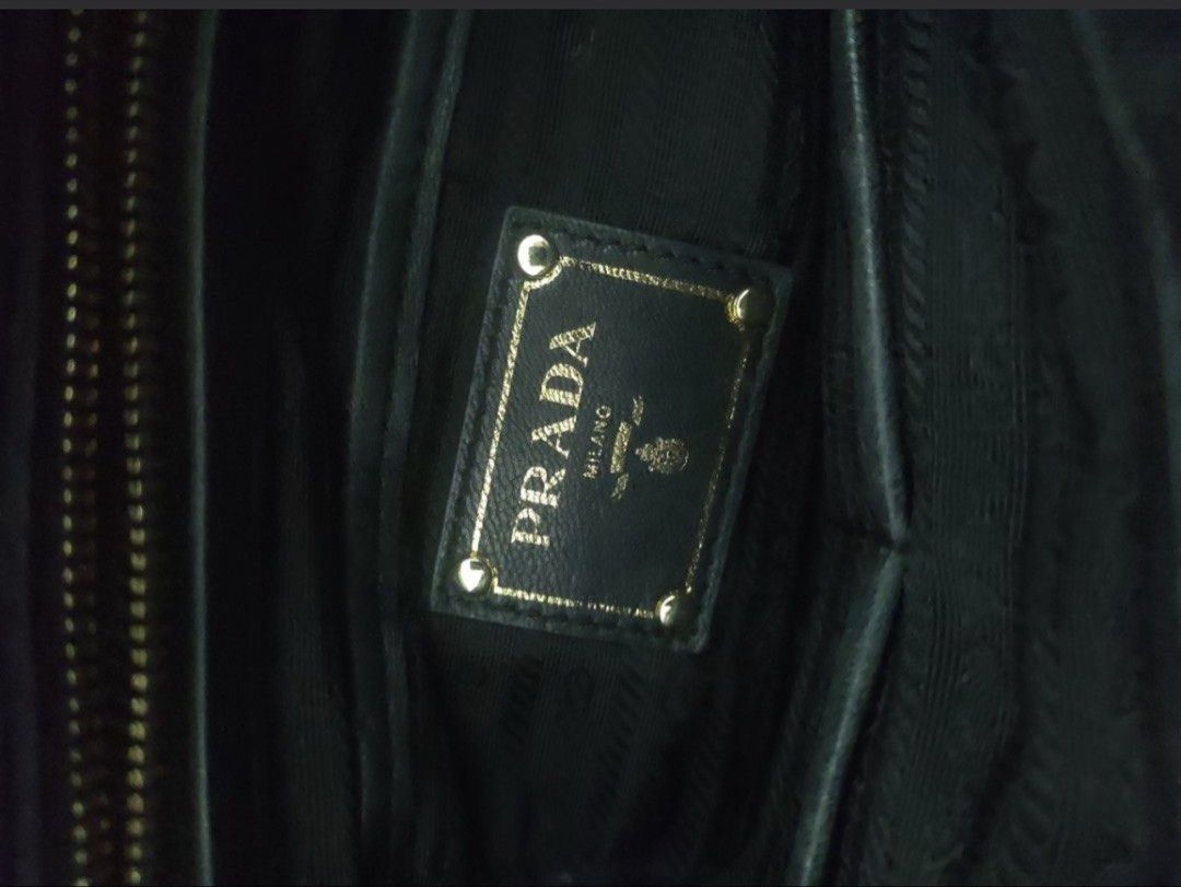 Prada Black Nylon Handbag (Category: Luxury Bags & Wallets) located in Makati City. Submitted by shebree (Listing ID 1426792808, Image 3). Description: No inclusion No refund, return or exchange Pay first Paid transaction will be considered as final .