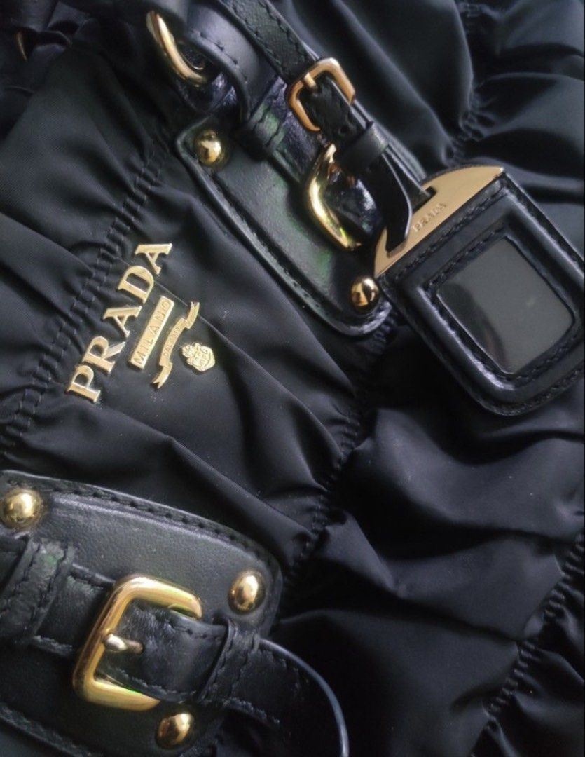 Prada Black Nylon Handbag (Category: Luxury Bags & Wallets) located in Makati City. Submitted by shebree (Listing ID 1426792808, Image 2). Description: No inclusion No refund, return or exchange Pay first Paid transaction will be considered as final .