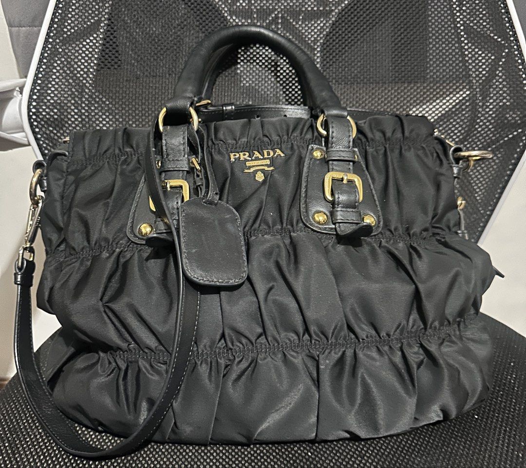 Prada Black Nylon Handbag (Category: Luxury Bags & Wallets) located in Makati City. Submitted by shebree (Listing ID 1426792808, Image 1). Description: No inclusion No refund, return or exchange Pay first Paid transaction will be considered as final .