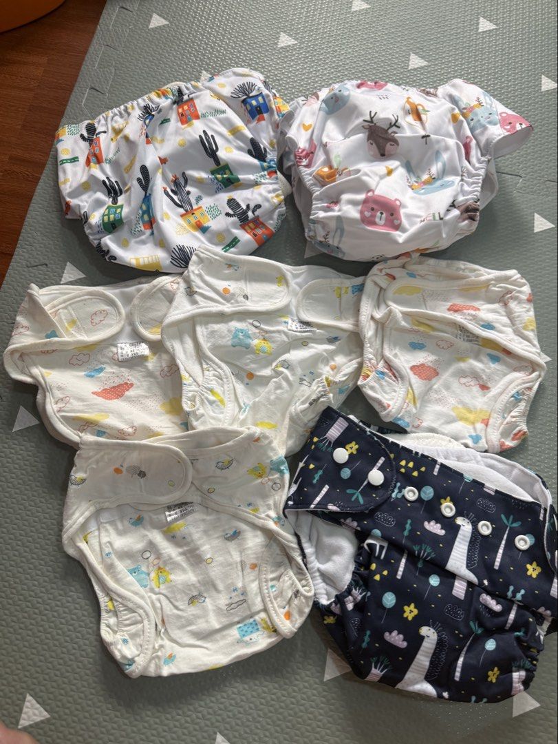 Random cloth diapers (Category: Babies & Kids Fashion) located in Manila. Submitted by declutterwithg (Listing ID 1426832997, Image 1). Description: 400 take all can be used starting NB up ( adjustable ) 7pcs .