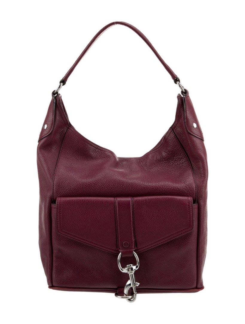Rebecca Minkoff Burgundy Leather Hobo Bag (Category: Luxury Bags & Wallets) located in Makati City. Submitted by gnarlyb (Listing ID 1426811199, Image 1). Description: Burgundy leather hobo bag by Rebecca Minkoff. Features a front pocket with a flap closure and a silver-tone clasp. The bag has a top zipper closure and a single shoulder strap. The leather has a pebbled texture. A small silver-tone brand plate is visible on the bag. excellent condi