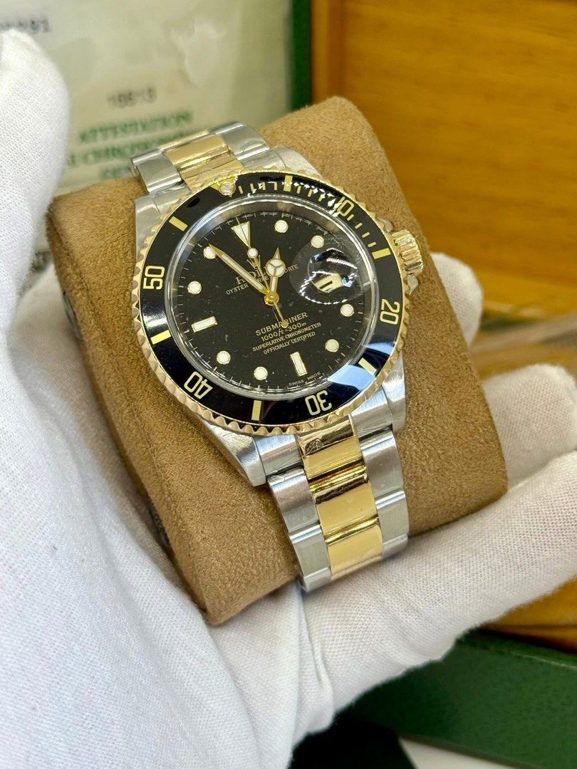 Rolex Submariner 16613 Two-Tone (Category: Luxury Watches) located in Cabanatuan. Submitted by albertgonzales27 (Listing ID 1426956409, Image 3). Description: COLLECTORS SET ✅💯🤿 Submariner Date Black Pre Ceramic Reference 16613 2001 year model, Local AD 40mm case size 18ct Gold / Steel Two-tone Continues bracelet First owned acquired 9/10 pristine condition Rare to see in FULL SET w/ receipt Trades accepted up or down P650,000 only 🤩🤩🤩.
