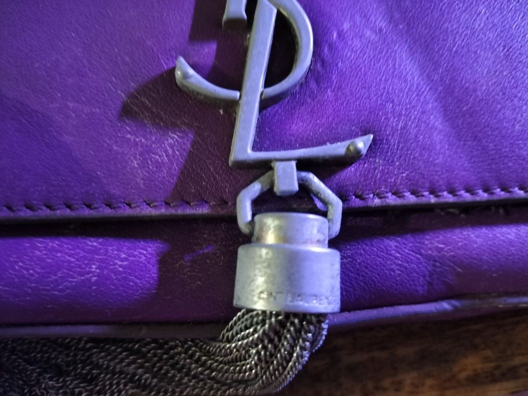 Saint Laurent Purple Shoulder Bag (Category: Luxury Bags & Wallets) located in Angeles City. Submitted by morikori (Listing ID 1426894317, Image 3). Description: please manage your expectations with wear and tear genuine leather one screw replaced hardware faded leather slightly worn out but still in good leather condition just needs leather spa or conditioner ikaw nlng pa-spa sa leather doctor buyer pays for the shipping fee LOCATION: ANGELES CI