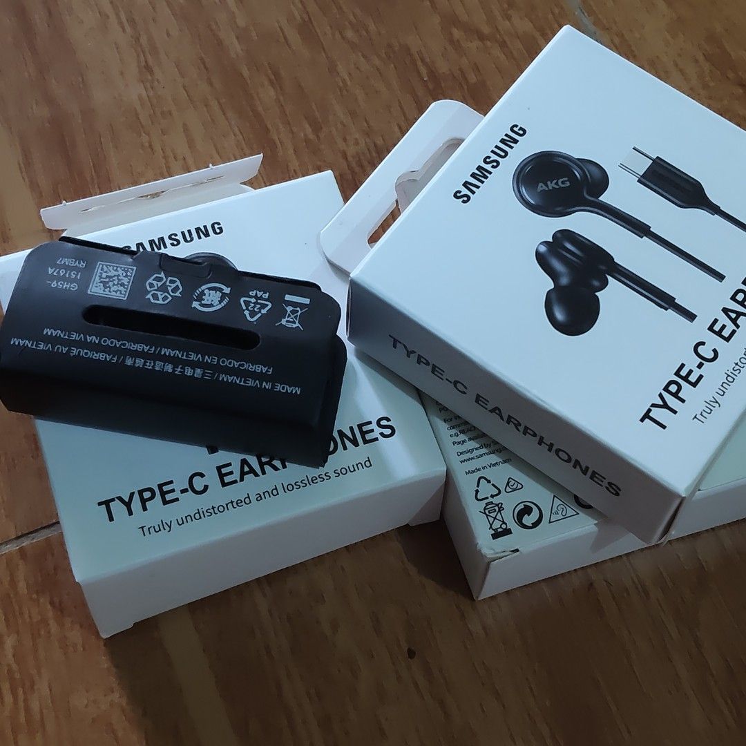 Samsung AKG Type-C Earphones (Category: Earphones) located in Paranaque City. Submitted by audioaddict0517 (Listing ID 1426958582, Image 2). Description: Samsung AKG Type-C earphones. These black earphones come with a Type-C connector. The box indicates "Truly undistorted and lossless sound". The earphones are in their original packaging. The box also includes the Samsung and AKG branding..