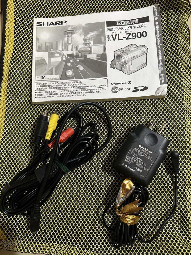 Sharp VL-Z900 Digital Video Camera Cable and Charger (Category: Cameras) located in Rodriguez. Submitted by pwestoonlinestore (Listing ID 1426866018, Image 1). Description: .