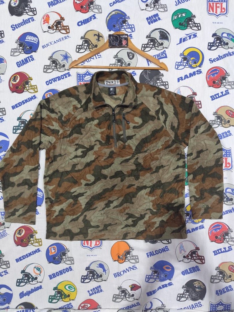 Starter Camo Fleece Jacket (Category: Coats, Jackets and Outerwear) located in Baguio. Submitted by FRANKLIN (Listing ID 1426875002, Image 2). Description: Starter fleece jacket features a camouflage pattern with a quarter-zip closure. It has long sleeves and a stand-up collar. The jacket is made of 100% polyester. The size is L (42-44)..