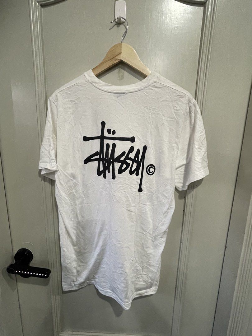 Stussy White T-shirt (Category: Tshirts & Polo Shirts ) located in Manila. Submitted by declutterprom (Listing ID 1426868686, Image 3). Description: 18.5 by 27 Blue stain Needs wash .