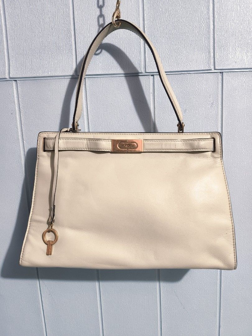 Tory Burch Handbag (Category: Luxury Bags & Wallets) located in Mandaue City. Submitted by prekfinds (Listing ID 1426802870, Image 1). Description: Tory Burch Hand bag Lee Radziwill Petite Biege Leather Excellentcondition 9.9/10colorate Dimes:12W x 8.5L minimal scratch minimal sign of usage no major flaws very presentable inside and out .