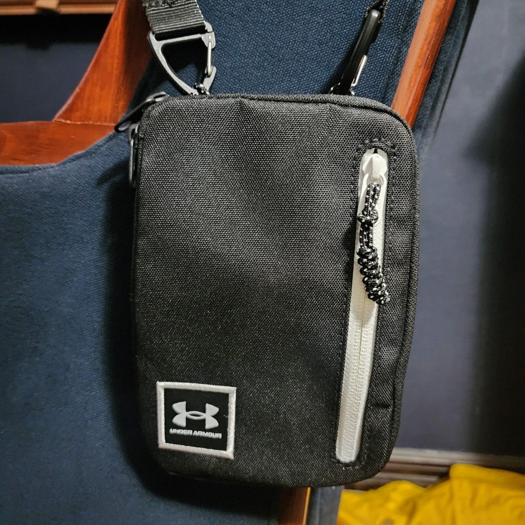 Under Armour Loudon Crossbody Bag (Category: Cross-body Bags) located in Binan City. Submitted by dottienook (Listing ID 1426888548, Image 2). Description: Under Armour. The bag includes an adjustable strap and multiple compartments for organizing essentials. sf at buyers expense.