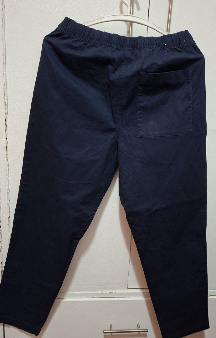 Uniqlo Navy Blue Pants - Size S (Category: Other Bottoms) located in Quezon City. Submitted by ktin20 (Listing ID 1426936479, Image 2). Description: Uniqlo navy blue pants. Features an elastic waistband and a single back pocket. Made of 98% cotton and 2% spandex. Size S. Made in China..