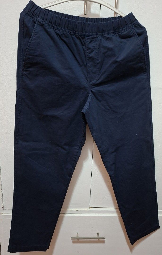 Uniqlo Navy Blue Pants - Size S (Category: Other Bottoms) located in Quezon City. Submitted by ktin20 (Listing ID 1426936479, Image 1). Description: Uniqlo navy blue pants. Features an elastic waistband and a single back pocket. Made of 98% cotton and 2% spandex. Size S. Made in China..