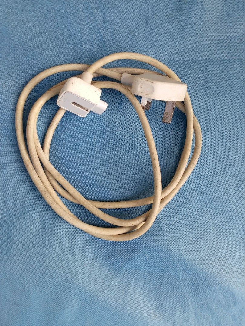 Used apple power cable extension (Category: Electrical, Adaptors & Sockets) located in Marikina City. Submitted by norman213 (Listing ID 1426882415, Image 3). Description: - Used Apple power cable extension - White color - Fully functional - Extends power reach.