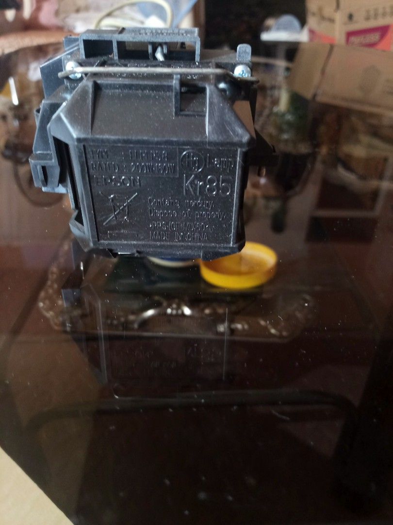 Used replacement projector lamp EB S9 (Category: Projectors) located in Marikina City. Submitted by norman213 (Listing ID 1426865608, Image 3). Description: - Used replacement projector lamp for Epson EB-S9. - Ready to replace your old lamp..