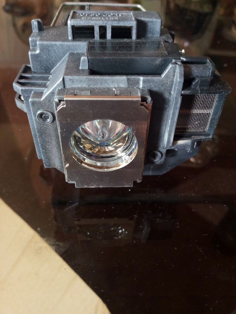 Used replacement projector lamp EB S9 (Category: Projectors) located in Marikina City. Submitted by norman213 (Listing ID 1426865608, Image 1). Description: - Used replacement projector lamp for Epson EB-S9. - Ready to replace your old lamp..