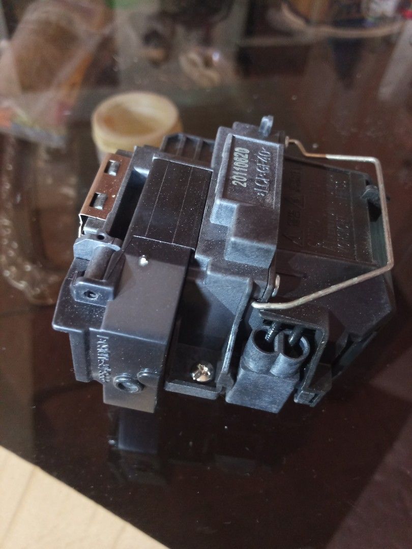 Used replacement projector lamp EB S9 (Category: Projectors) located in Marikina City. Submitted by norman213 (Listing ID 1426865608, Image 2). Description: - Used replacement projector lamp for Epson EB-S9. - Ready to replace your old lamp..