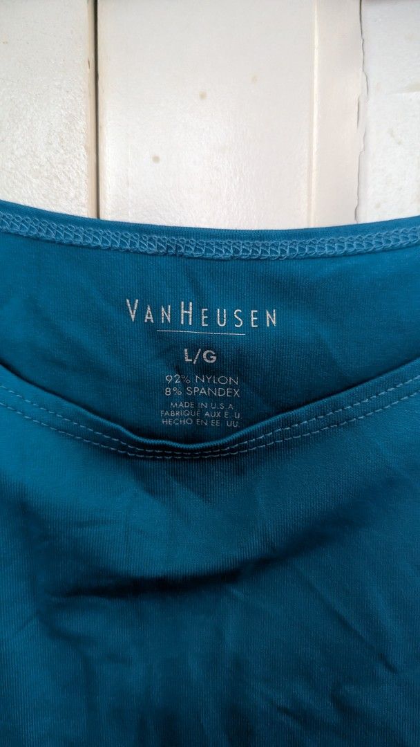 Van Heusen Teal Tank Top - Size L (Category: Sleeveless) located in Muntinlupa City. Submitted by lsfinds (Listing ID 1426834116, Image 2). Description: Teal tank top from Van Heusen. It is a size L. Made of 92% nylon and 8% spandex. The tank top has a scoop neck and a sleeveless design. A versatile piece for everyday wear..